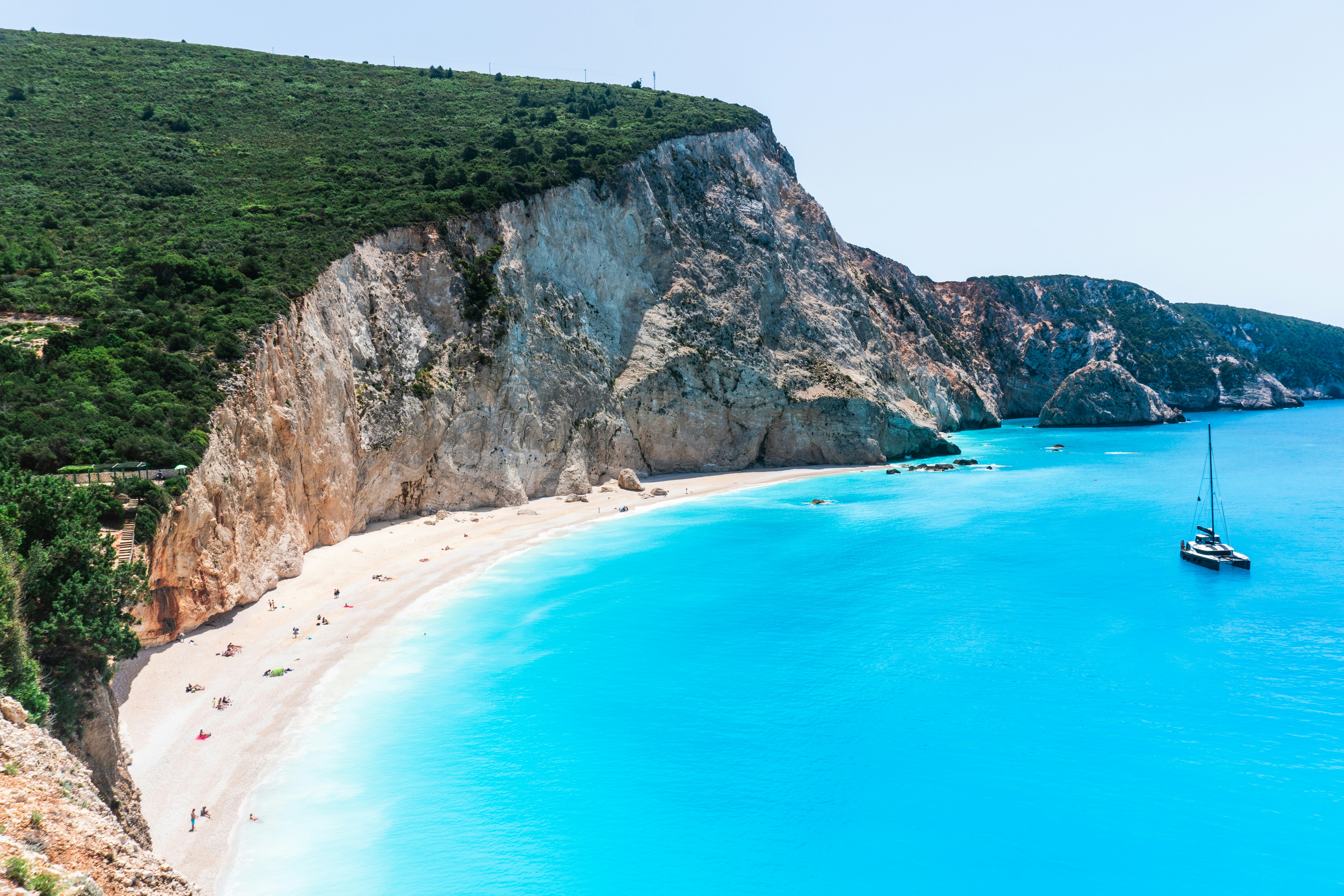 Aerial view of Desimi beach, Lefkada, surrounded by crystal-clear Ionian water