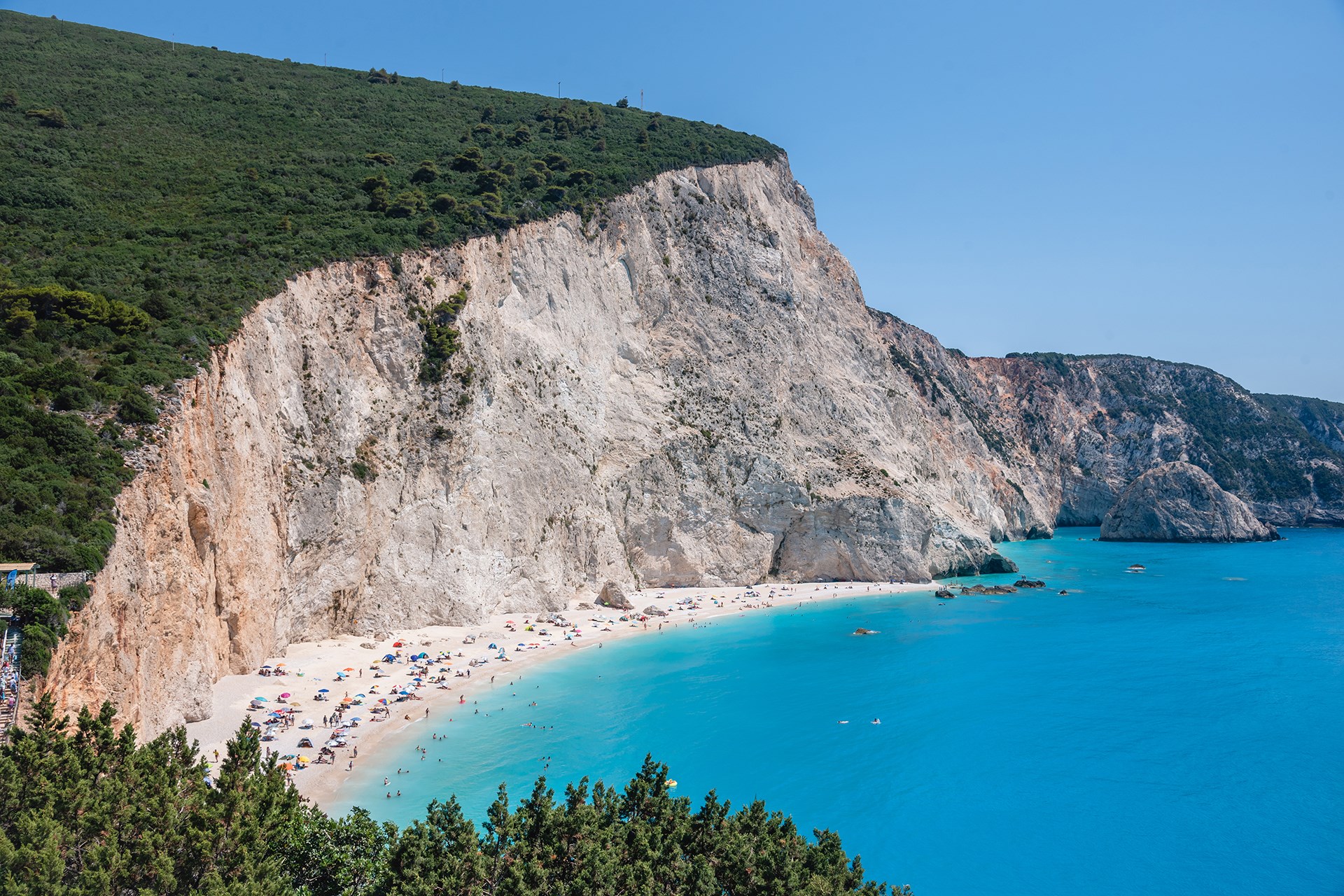 Porto Katsiki beach white pebbles chalk cliffs turquoise Ionian sea Lefkada Greece