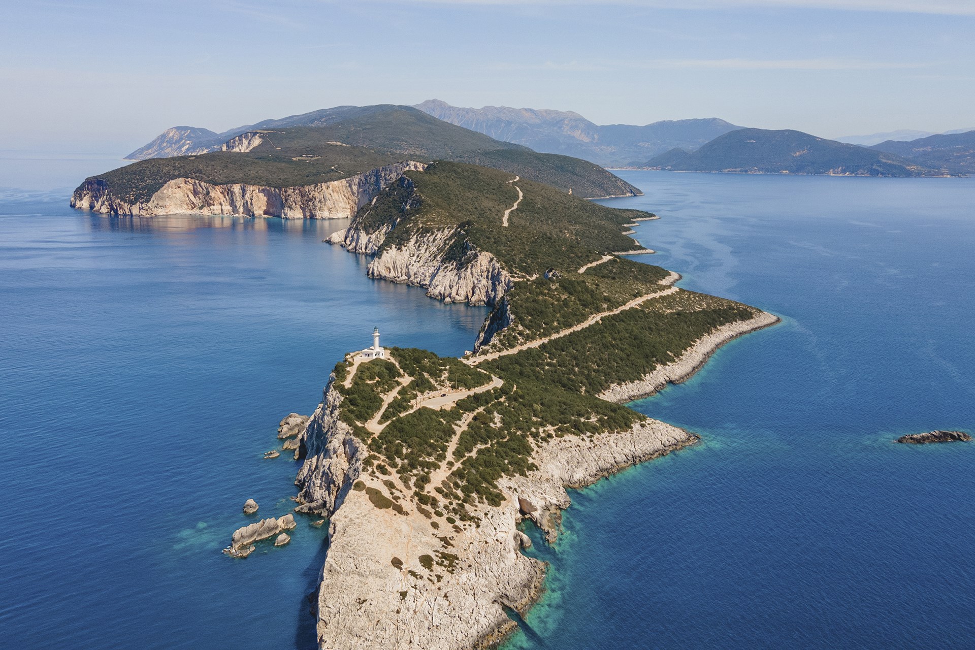 Cape Lefkatas lighthouse dramatic white cliffs southernmost tip Lefkada Greece