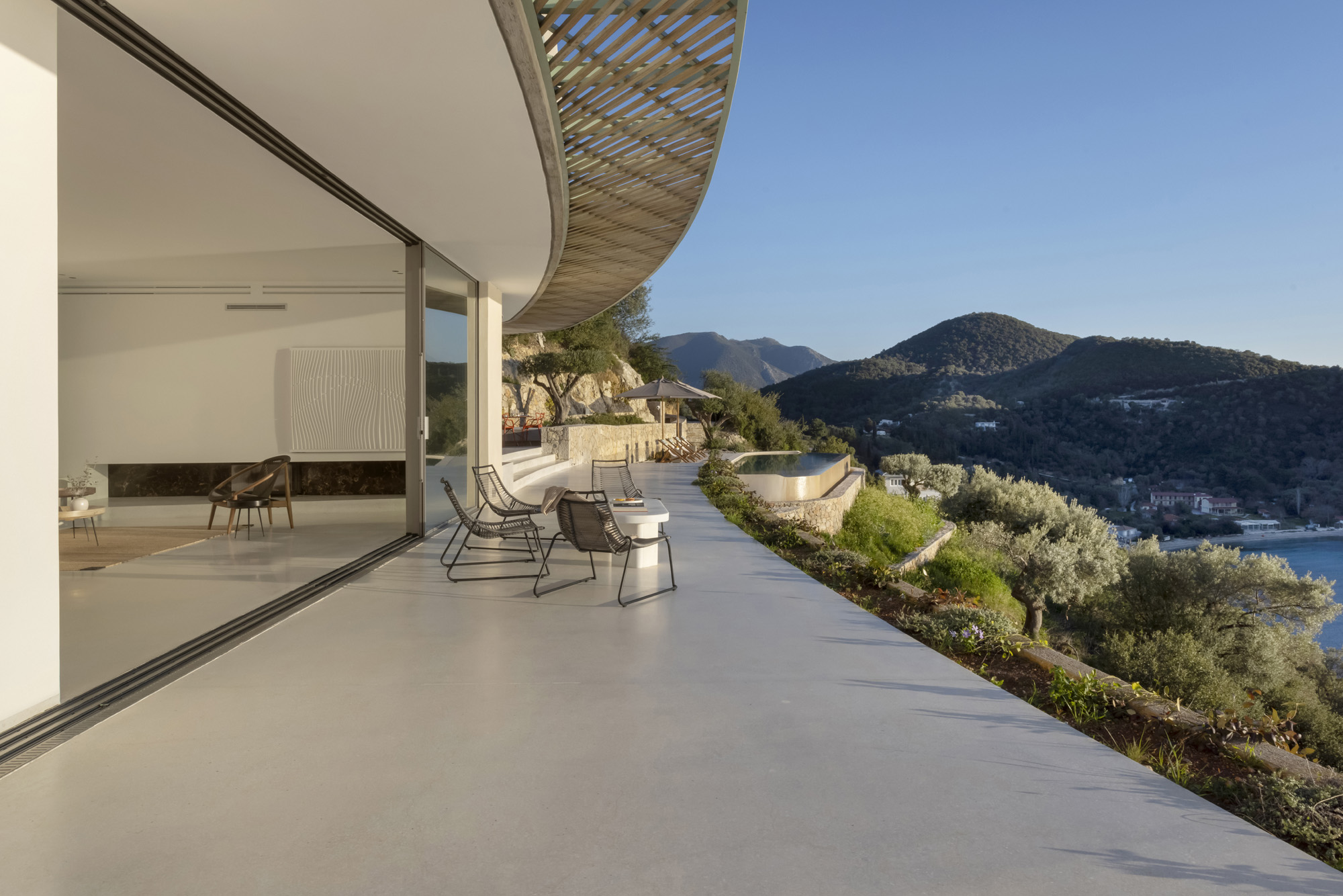 Thyta House infinity pool golden hour Lefkada